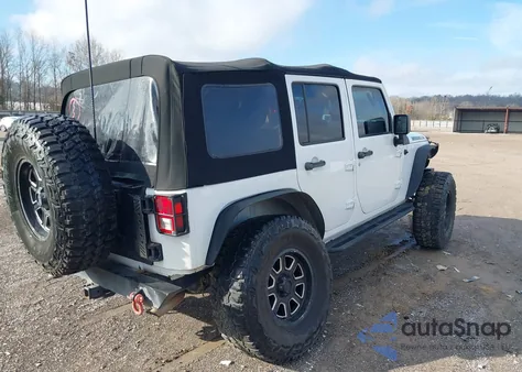 2016 Jeep Wrangler Unlimited Black Bear z USA, uszkodzony, nr VIN 1C4BJWDGXGL185912